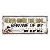 Nástěnná kovová cedule Never Mind The Dog - 50*1*20 cm