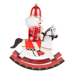 Bílo-červená dekorace Louskáček na houpacím koníkovi - 24*9*30 cm